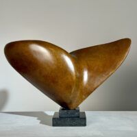 Alt text: Abstract bronze sculpture