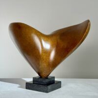 Alt text: Abstract bronze sculpture
