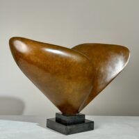 Alt text: Abstract bronze sculpture