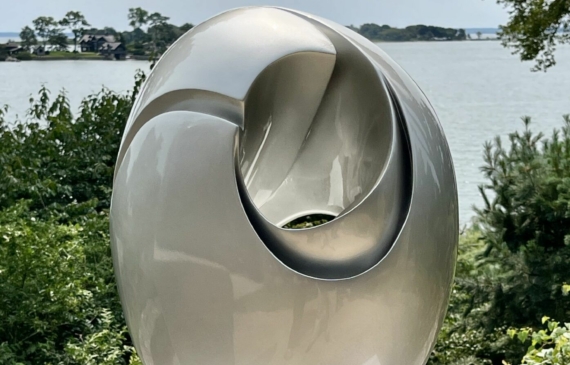 Alt text: glossy, oval shaped sculpture