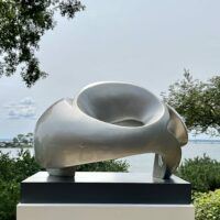 Alt text: glossy, oval shaped sculpture