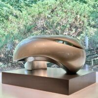 Alt text: glossy, oval shaped sculpture