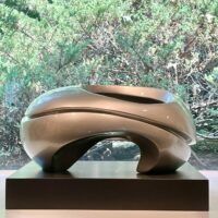 Alt text: glossy, oval shaped sculpture