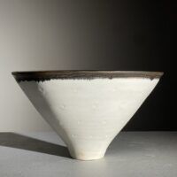 Alt text: Porcelain bowl