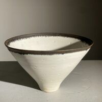 Alt text: Porcelain bowl