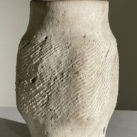 Alt text: White stoneware vase