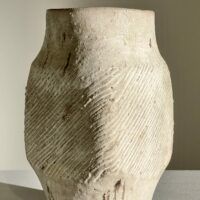 Alt text: White stoneware vase