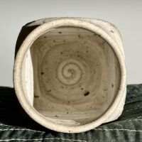 Alt text: White stoneware vase