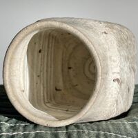 Alt text: White stoneware vase