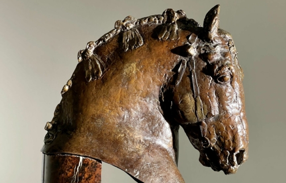 Alt text: Bronze sculpture of a horse's head