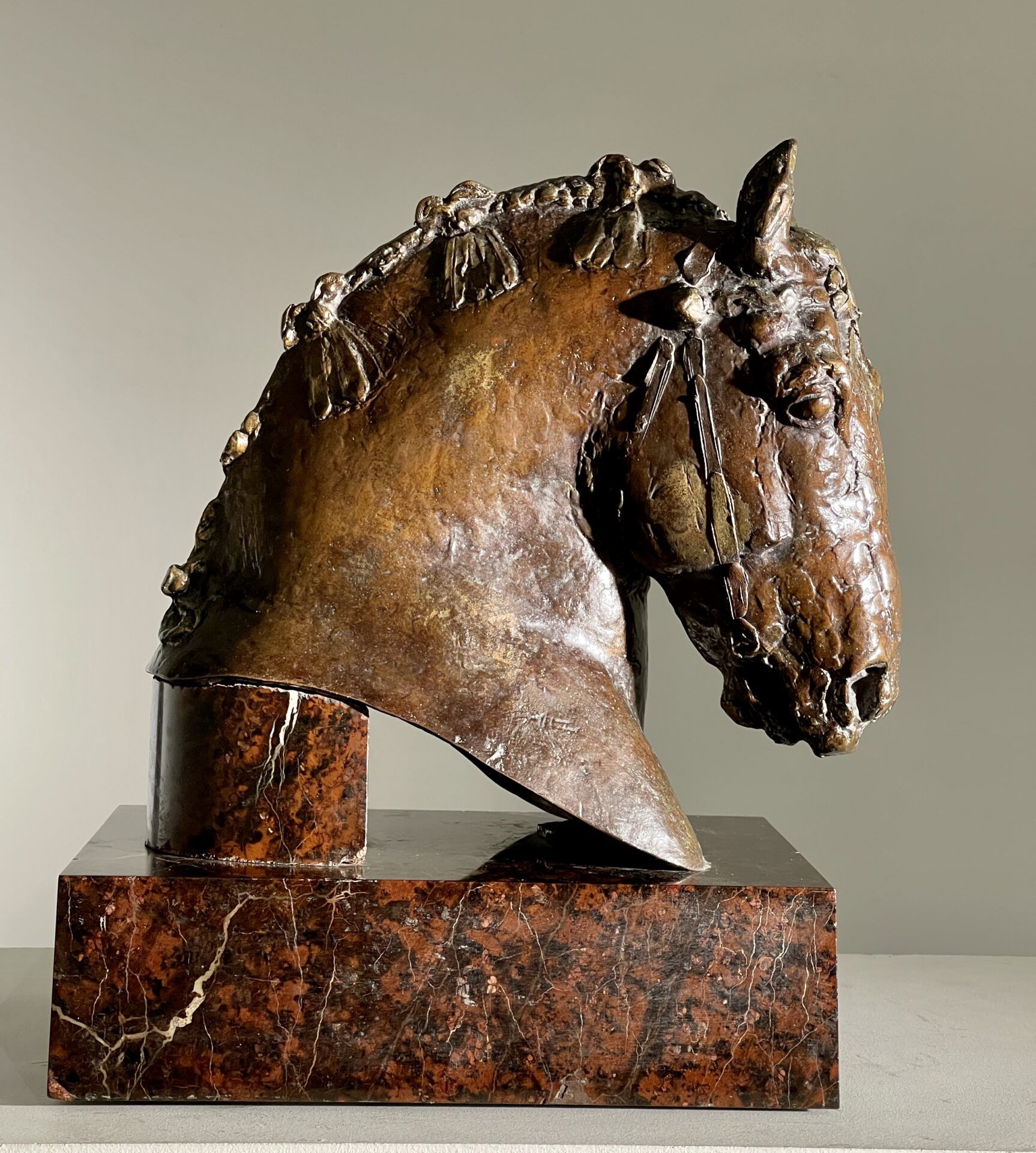 Alt text: Bronze horsehead