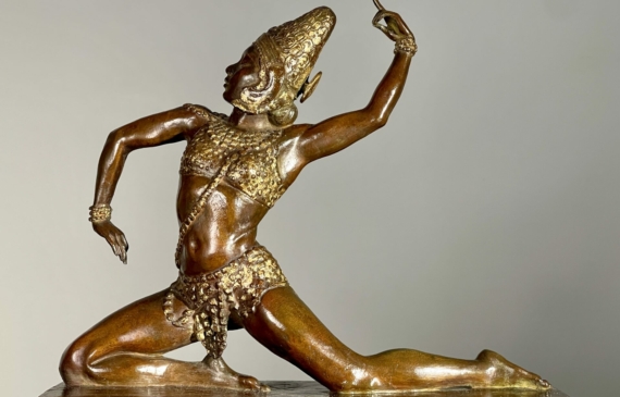 Alt text: Bronze sculpture of a female dancer