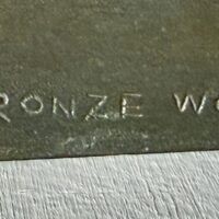 Alt text: Bronze sculpture, foundry detail