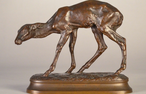 Alt text: Bronze sculpture of a young fawn