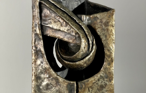 Alt text: Abstract metal sculpture