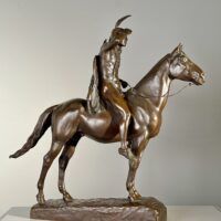 Alt text: Bronze sculpture of a man on horseback