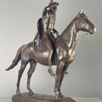 Alt text: Bronze sculpture of a man on horseback