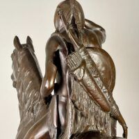 Alt text: Bronze sculpture of a man on horseback