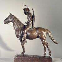 Alt text: Bronze sculpture of a man on horseback