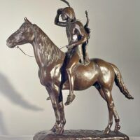 Alt text: Bronze sculpture of a man on horseback