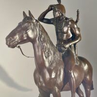 Alt text: Bronze sculpture of a man on horseback