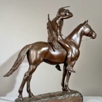 Alt text: Bronze sculpture of a man on horseback