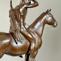 Alt text: Bronze sculpture of a man on horseback