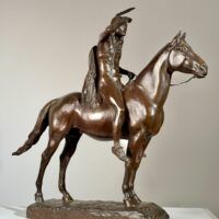 Alt text: Bronze sculpture of a man on horseback