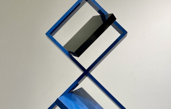 Alt text: Blue geometric sculpture