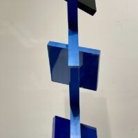 Alt text: Blue geometric sculpture