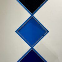 Alt text: Blue geometric sculpture