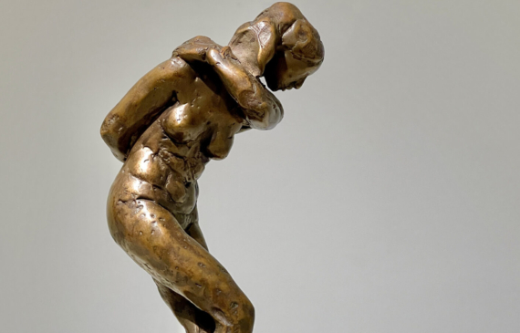 Alt text: Bronze sculpture of a dancing figure