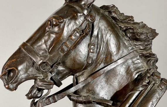 Alt text: Bronze sculpture of a horse head