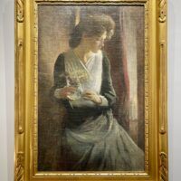 Alt text: Portrait of a woman, framed