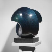 Alt text: Blue spherical bronze sculpture