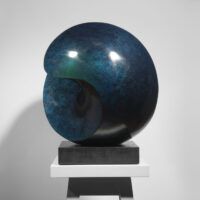 Alt text: Blue spherical bronze sculpture