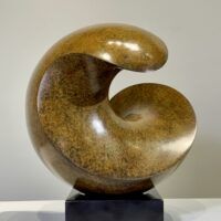 Alt text: Spherical bronze sculpture