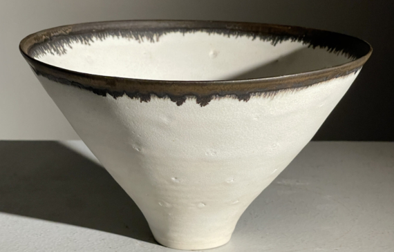 Alt text: Porcelain bowl