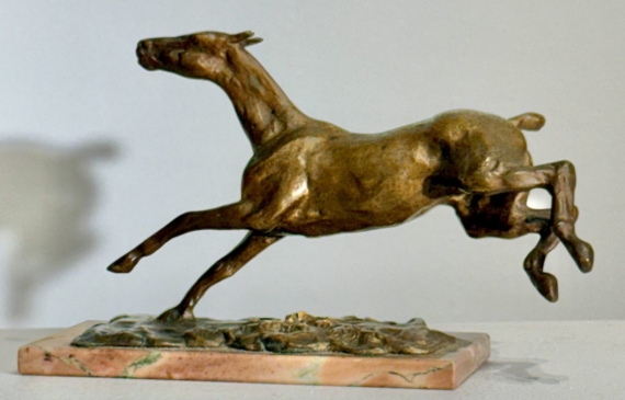 Alt text: Bronze sculpture of a horse