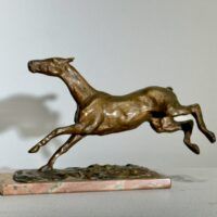 Alt text: Bronze sculpture of a horse