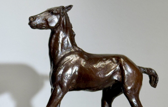 Alt text: Bronze sculpture of a horse
