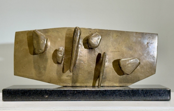Alt text: Abstract bronze sculpture