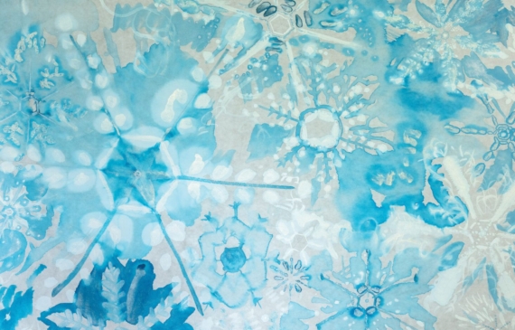 Alt text: watercolor painting of overlapping blue and white snowflakes
