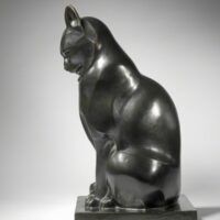 Alt text: Sculpture of a seated cat