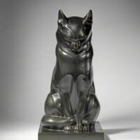 Alt text: Sculpture of a seated cat