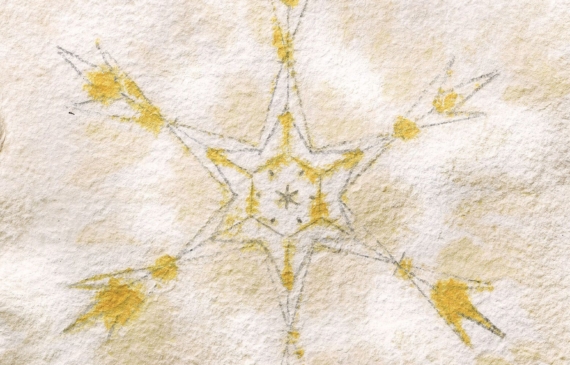 Alt text: watercolor painting of a snowflake in yellow