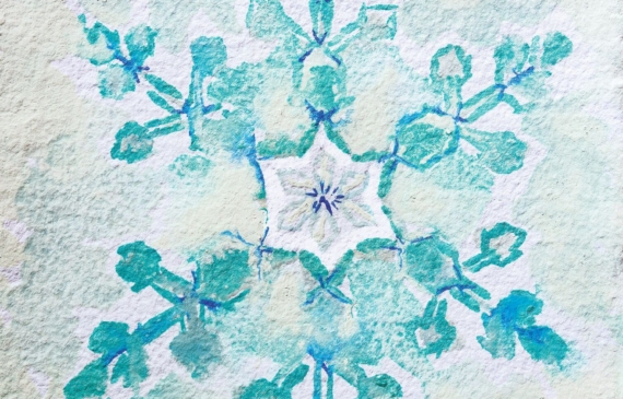 Alt text: watercolor painting of a snowflake in blue