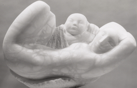Alt text: Alabaster sculpture of two floating figures