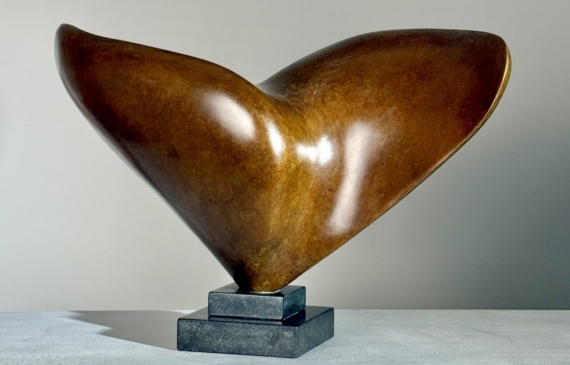 Alt text: Abstract bronze sculpture