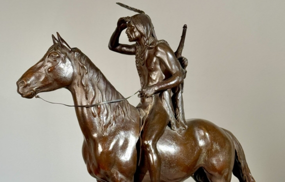 Alt text: Bronze sculpture of a man on horseback